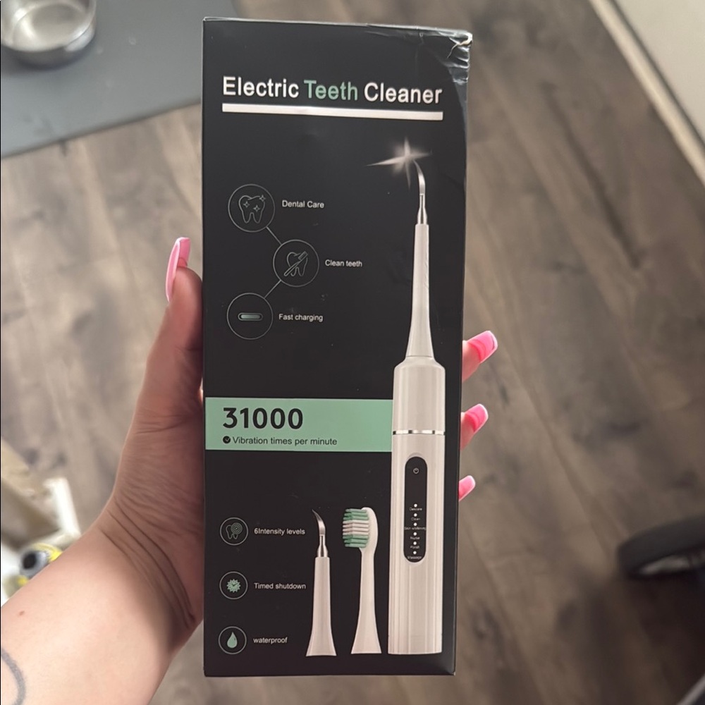 Electric Teeth Cleaner - White